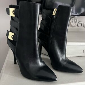 Marciano Black Heeled Boots with Gold Accents